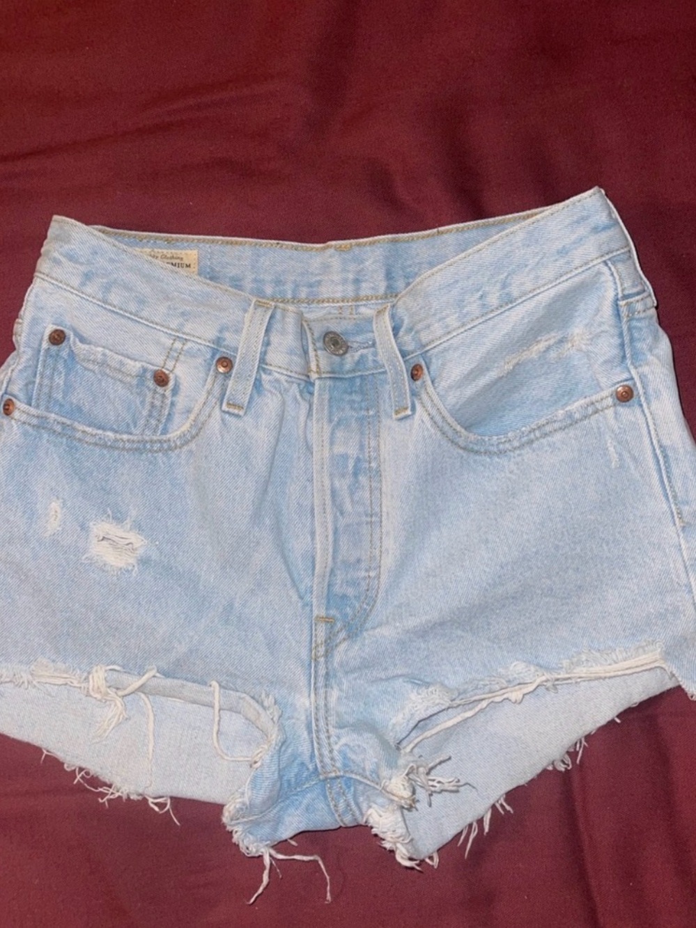 Levi's Light Blue Distressed High-Rise Jean Shorts